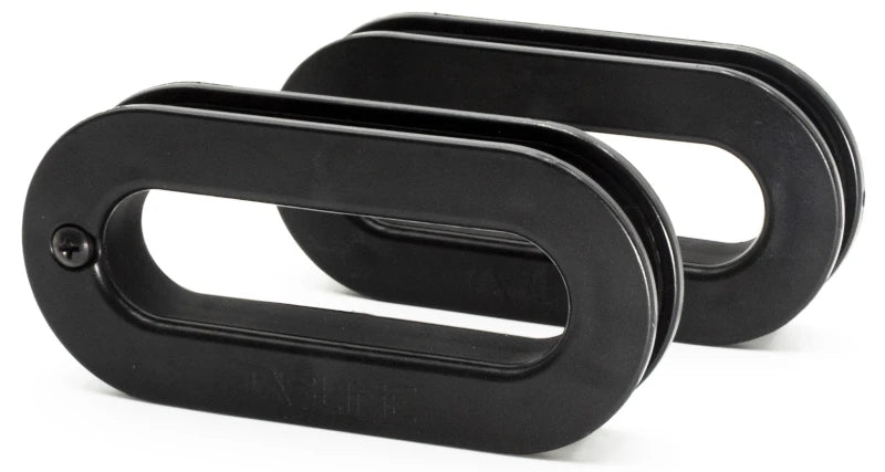 Two black oval Tasline knot pullers side by side on a white background